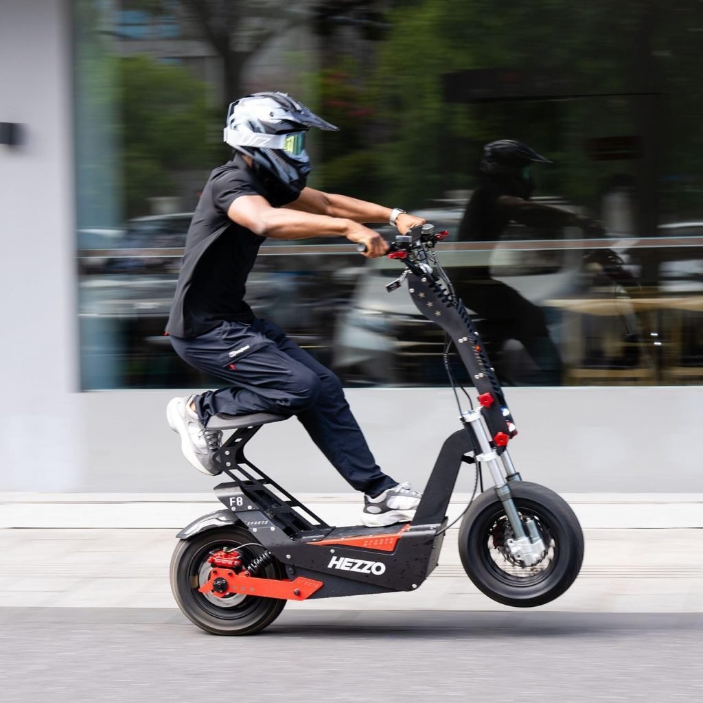 HEZZO F8 Escooter 72V 8000W Motor Foldable Electric Scooter for Adults with Seat NFC Dual Brake System 50Ah 21700 Lithium Battery 16 Fat Tires Off Road Range 65Miles Skateboard